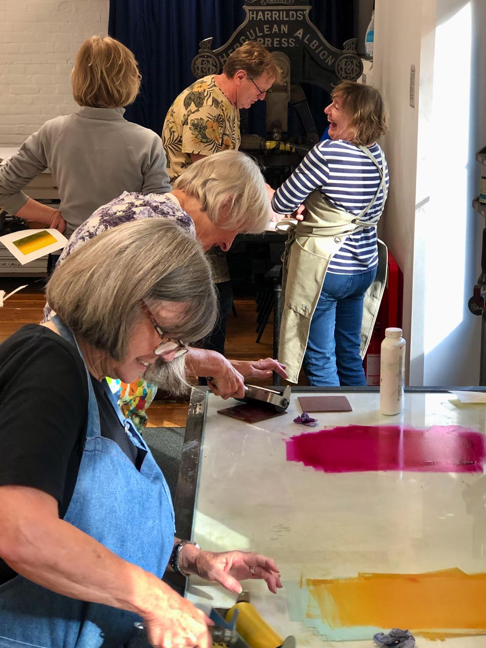 People making art in our printmaking studio
